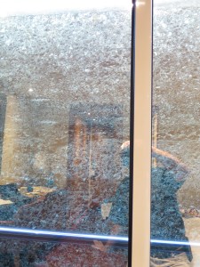 Mark's image in our door as he tries to get photo of lock wall.