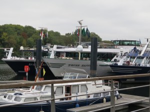 Our boat is triple parked.